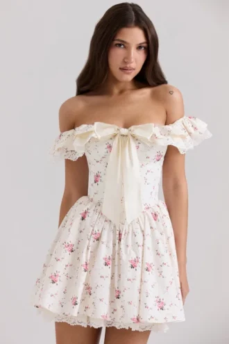 Jaide miniklänning i stretchbomull med blommönster och axelbandslösa axlar
